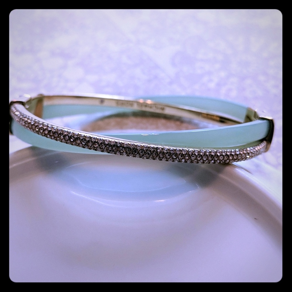 MK CZ bracelet with green detail.
